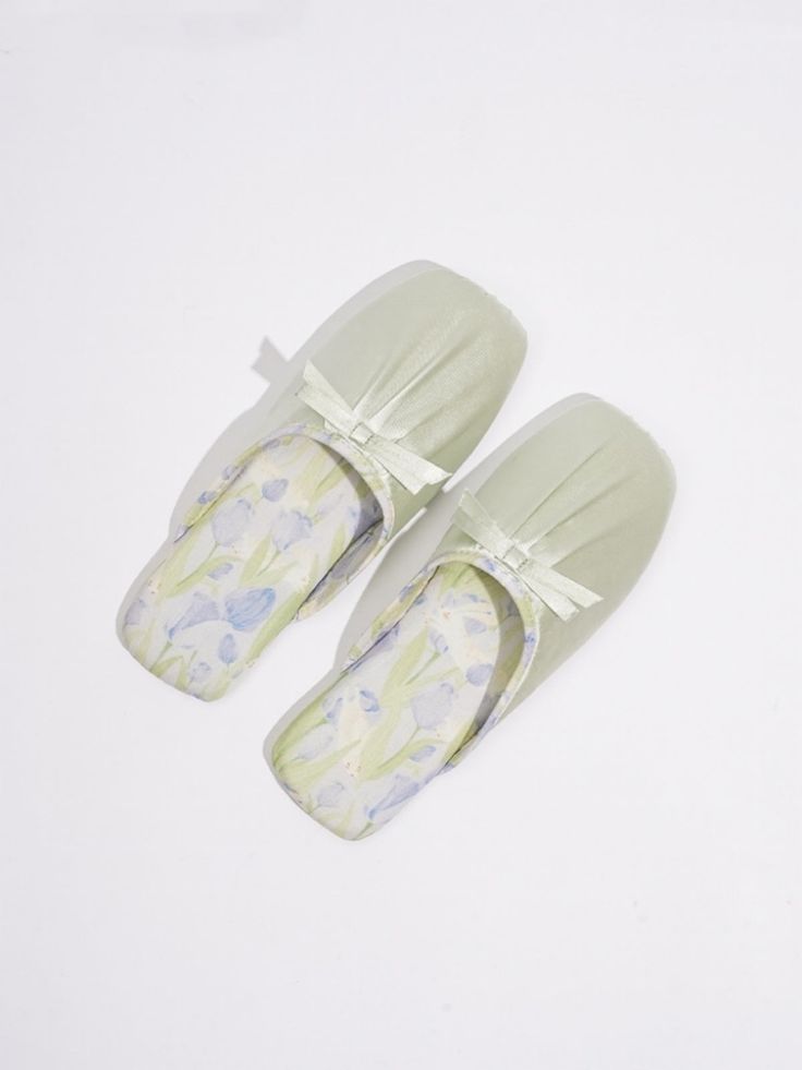 Elevate your summer style with this Ink Floral Print Slippers. Crafted to perfection, these slippers boast a skin-friendly satin fabric upper, offering a luxurious feel with a subtle sheen that's both smooth and breathable.Experience unparalleled comfort with our soft and resilient midsole, providing cushioning with every step, while the anti-slip rubber outsole ensures stability on any surface.Embrace the artistry of traditional ink floral prints with our unique design, adding a touch of sophistication to your ensemble. Step into elegance and comfort with Ulivary's Ink Floral Print Toe Sandals, where style meets craftsmanship. Elegant Summer Slip-ons With Round Toe, Green Flat Heel Slip-ons For Spring, Elegant Open Toe Slip-ons For Summer, Comfortable Green Slip-ons For Spring, Elegant Summer Slip-ons With Cushioned Footbed, Feminine Slip-on Flats For Spring, Green Flat Slip-ons For Summer, Elegant Slip-on Synthetic Slippers, Elegant Beach Flats For Spring