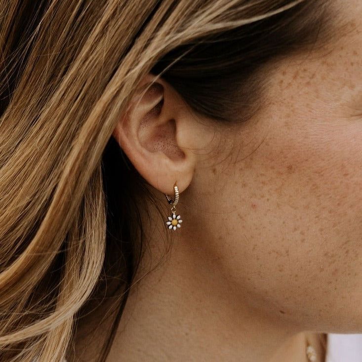 Dainty floral drop hoops. High quality gold vermeil (gold plated sterling silver). Hypoallergenic and good for sensitive skin. Delicate Flower Shaped Hoop Earrings, Delicate Flower-shaped Hoop Earrings, Tiny Minimalist Flower Earrings, Delicate Hypoallergenic Flower Earrings For Everyday Wear, Everyday Gold Hypoallergenic Flower Earrings, Dainty Hypoallergenic Flower Earrings, Dainty Yellow Gold Flower Earrings, Dainty Hypoallergenic Flower Hoop Earrings, Dainty Flower-shaped Hypoallergenic Hoop Earrings