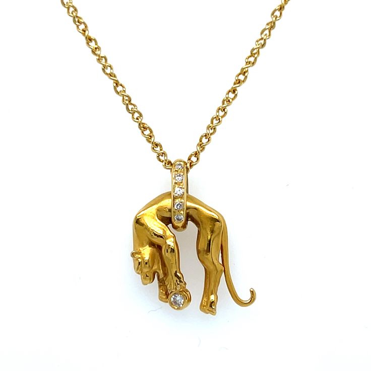 This Vintage 18K Yellow Gold Carrera y Carrera Panther Pendant with Diamonds is such a rare find, and such a statement piece! Dating to 1999, this fantastic necklace is signed and stamped, and in excellent condition. LOVE this guy!  The chain is 18 inches.  The panther is 3/4 inch in length, including the bail.  The whole piece weighs 8. grams of solid 18K Yellow Gold.  There are 6 Round Brilliant Cut Diamonds, totaling approx 0.15ct, of F/VS1 quality. Carrera Y Carrera, This Guy, Round Brilliant Cut Diamond, Round Brilliant, Pendant Necklaces, Panther, Statement Pieces, Jewelry Necklace Pendant, 4 Inch