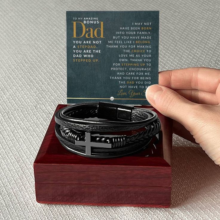 Are you looking for a unique gift idea for your bonus dad? One that is special from his bonus son? Celebrate him with this stunningMen's Braided Leather Bracelet with a Cross with a heartfelt keepsake message. It makes for a wonderful Christmas, birthday, or retirement gift.Our Men's Braided Leather Bracelet with Cross with a heartfelt keepsake message for him is an exquisite bracelet is crafted with meticulous attention to detail, using high-quality materials, to create a beautiful piece that i Personalized Black Leather Bracelet For Father's Day, Father's Day Gift Black Leather Bracelet, Black Leather Bracelet For Father's Day, Father's Day Leather Bracelet Gift, Leather Bracelet Gift For Father's Day, Leather Bracelet For Father's Day Gift, Bracelet With Cross, Birthday Presents For Him, Messages For Him