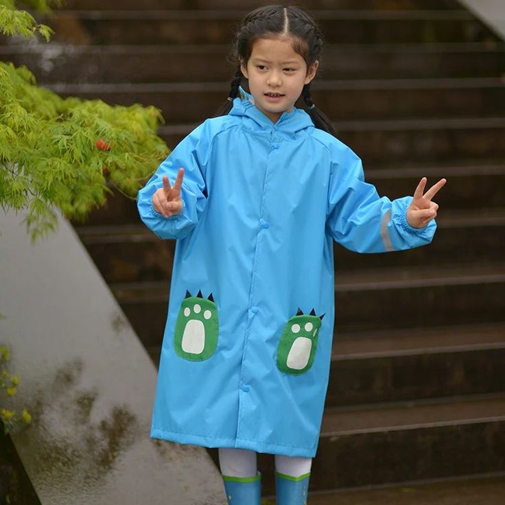 Stay Dry and Play On with Our Kids Waterproof Raincoat Jumpsuit Introducing the perfect rain gear for your little adventurers - the Kids Waterproof Raincoat Jumpsuit! Designed to keep children dry and comfortable, this raincoat is ideal for all their outdoor activities, whether it's a walk to school, a weekend hiking trip, or a fun playdate in the rain. Made from durable nylon, it offers excellent protection against the elements, ensuring your child remains cozy and dry no matter the weather. Av Playful Winter Raincoat For Playtime, Waterproof Winter Outerwear For Playtime, Playful Waterproof Hooded Outerwear, Playful Hooded Waterproof Outerwear, Waterproof Long Sleeve Raincoat For Rainy Season, Playful Winter Playtime Raincoat, Playful Winter Raincoat For Rainy Weather, Waterproof Raincoat For Rainy Season, Winter Playtime Long Sleeve Raincoat