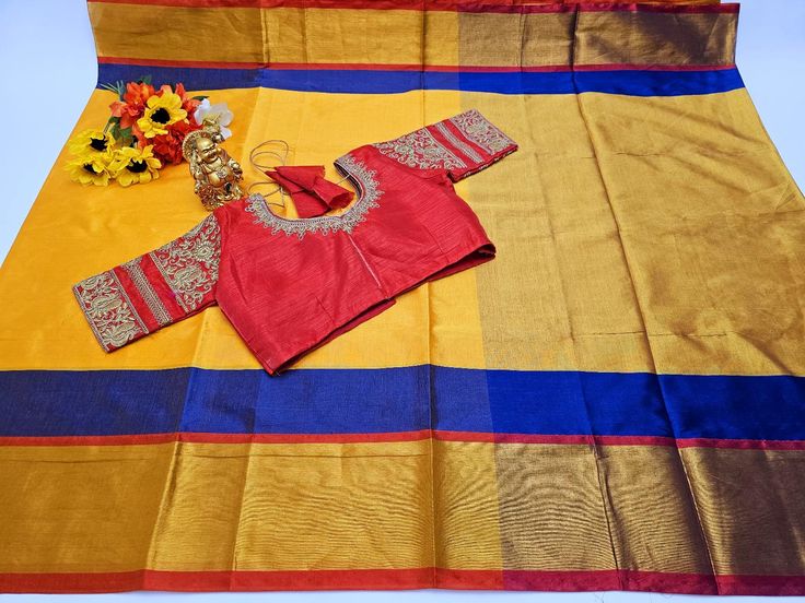 Elegant Silk Saree with intricate weaving work, accompanied by an unstitched running blouse and a FREE designer blouse, Perfect for Weddings/Parties. FABRIC : SOFT SILK CLOTH DESIGN : BEAUTIFUL PALLU AND DESIGN ON ALL OVER THE SAREE. BLOUSE : BEAUTIFUL  STITCHED DESIGNER BORDER BLOUSE WITH DANGLINGS. Color:Yellow and Red/Blue Saree: Fabric. :- Soft Silk Work :- Weaving Cute :- 5.5 mtr Blouse: Fabric:- Phantom Silk. with Fancy Border and designer work Work :- Embroidery thread work  Chest :-38 inches with margin on either sides(Can be altered 34-42 inches) Stitch Type: stitched Wash Instruction:- Dry Clean Only Occasion: Wedding Wear, Party Wear, Gifts for Her,Festive Wear, Engagement Wear, Mehndi Wear, Casual Wear Designer Wear Unstitched Blouse Piece With Border, Semi-stitched Blouse Piece With Border For Eid, Unstitched Blouse Piece With Border For Eid, Semi-stitched Blouse Piece With Border For Diwali, Semi-stitched Cotton Blouse Piece With Pallu, Navratri Semi-stitched Blouse Piece With Border, Unstitched Art Silk Blouse Piece With Border, Unstitched Blouse Piece With Border For Navratri, Designer Blouse Piece With Border For Diwali