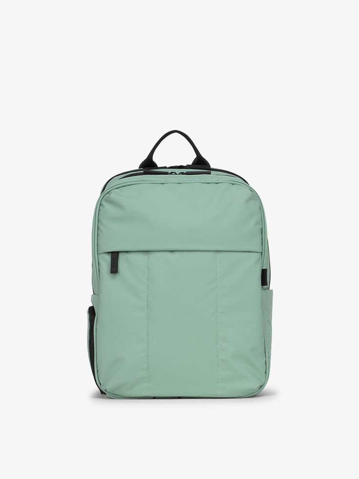 a green backpack on a white background