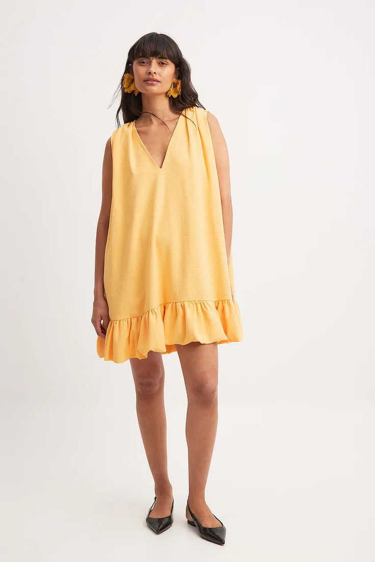 Frill Detail Sleeveless Mini Dress Summer Sleeveless V-neck Dress With Ruffles, V-neck Ruffle Hem Sundress, Ruffled Mini V-neck Dress For Vacation, Yellow V-neck Dress With Ruffle Hem, V-neck Ruffle Sundress For Vacation, Vacation Sundress With V-neck And Ruffles, Sleeveless Mini Sundress With Ruffle Hem, Sundress With Ruffle Hem In Mini Length, Vacation Sleeveless Mini Dress With Ruffle Hem