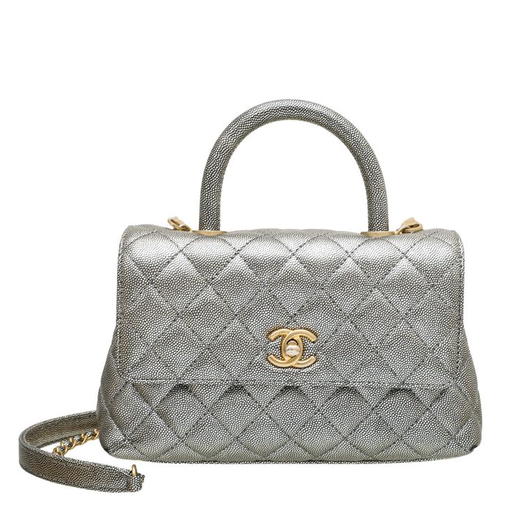 Material: Metallic Silver Quilted Stitched Caviar Leather Hardware: Gold Features: Pockets: Interior Zipper Pocket, Interior Flat Compartment Pocket, Exterior Flat Pocket Bag style: Shoulder Bag / Top Handle Closure type: Flap with CC Turn Lock Closure Serial Number / Stamp / Date Code: 28411067 Measurement in inches: W x D x H Inclusions: Dust Bag, Card & Box Price Excluding VAT Item location: Town Center BranchDelivery 5-8 or 10-15 working days Please note that during high season and Sale period, delivery times may be affected We accept payment with a Credit card, Debit card, or PayPal.Note: Our Items are totally New High quality Brand Inspired Refurbished. Please make sure you are well aware of it before buying any of the Item. T&C's Apply in case of refunds.Please send us message on be Designer Rectangular Shoulder Bag With Cc Turnlock Closure, High-end Rectangular Shoulder Bag With Cc Turnlock, Designer Top Handle Flap Bag With Cc Turnlock, Designer Top Handle Flap Bag With Cc Turnlock Closure, Designer Rectangular Flap Bag With Cc Turnlock Closure, High-end Shoulder Bag With Cc Turnlock For Evening, Designer Shoulder Bag With Cc Turnlock For Shopping, Designer Flap Bag With Cc Turnlock Closure For Shopping, Designer Flap Bag With Cc Turnlock For Shopping