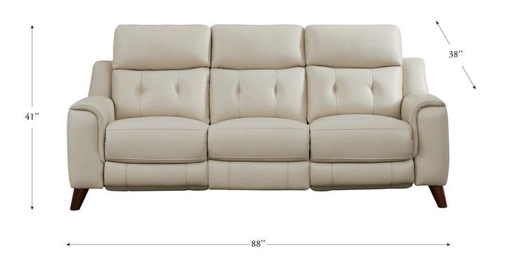 a white leather couch with measurements for it