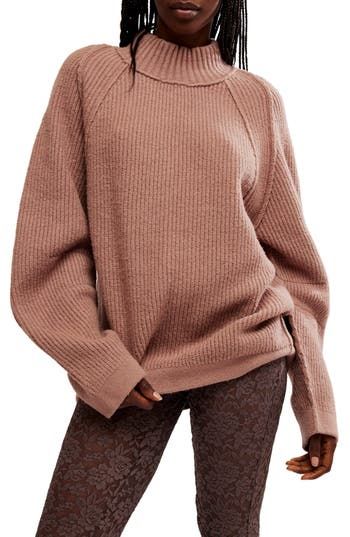 With roomy sleeves, a relaxed silhouette and turtleneck styling, this sweater is the ultimate in cozy-chic everyday wear. Turtleneck Long sleeves 58% cotton, 37% polyamide, 5% elastane Hand wash, dry flat Imported Fall Relaxed Fit Turtleneck, Relaxed Fit High Neck Sweater For Fall, High Neck Relaxed Fit Sweater For Fall, Relaxed Fit High Neck Turtleneck For Fall, Fall Loungewear Turtleneck With Funnel Neck, Cozy Stretch Turtleneck For Fall, Casual Relaxed Fit Turtleneck For Fall, Fall Turtleneck For Loungewear, Fall Sweater With Funnel Neck And Relaxed Fit