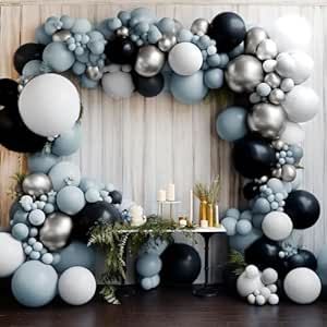 a balloon arch with black, white and silver balloons