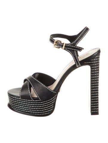 Schutz Leather SandalsBlackPlatformStraps & Buckle Closure at SidesDesigner Fit: This designer typically runs true to size.Unfortunately, due to restrictions, this item may not be eligible for shipping in all areas. Synthetic Strap Sandals For Night Out, Designer Black Strappy Sandals, Strapped Evening Sandals For Spring, Strapped Sandals With Heel Strap For Evening, Strapped Sandals For Night Out, Chic Strapped Synthetic Sandals, Strapped Leather Heels For Evening, Strapped Sandals For Night Out In Spring, Formal Strapped Sandals With Buckle Closure