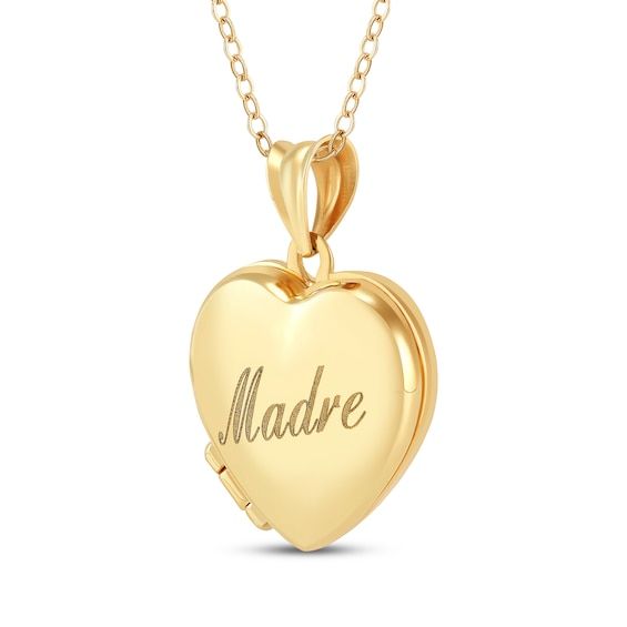 Your Madre will always treasure this meaningful heart locket. 10K yellow gold The heart locket features "Madre" engraved in a beautiful script font Opens to reveal space for a pair of small photos or mementos 16- to 18-inch adjustable cable chain with spring ring clasp 14k Gold Heart Pendant Locket For Anniversary, Mother's Day Heart Charm Locket Necklace Gift For Mom, Mother's Day Heart Locket Necklace With Hallmark, Valentine's Day Gift Locket Necklace For Mom, Gold Locket Necklace With Hallmark For Mother's Day, Gold Locket Necklace For Mother's Day With Hallmark, Gold Locket Necklace For Mother's Day, Engraved Locket Necklace For Mom For Valentine's Day, Gold Locket Necklace For Mom On Valentine's Day