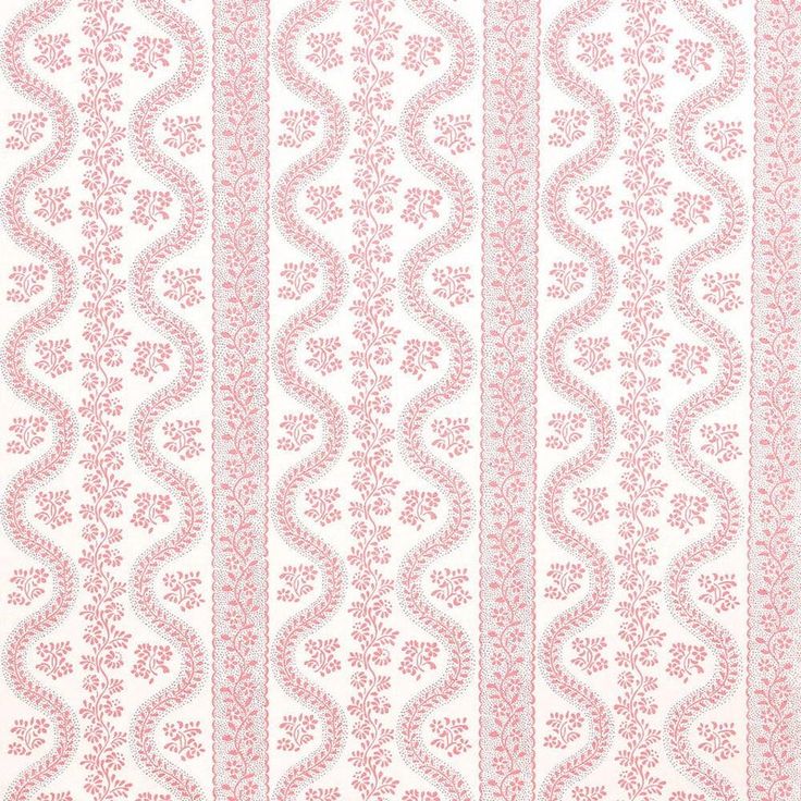 a pink and white striped wallpaper with an intricate design on the bottom half of it