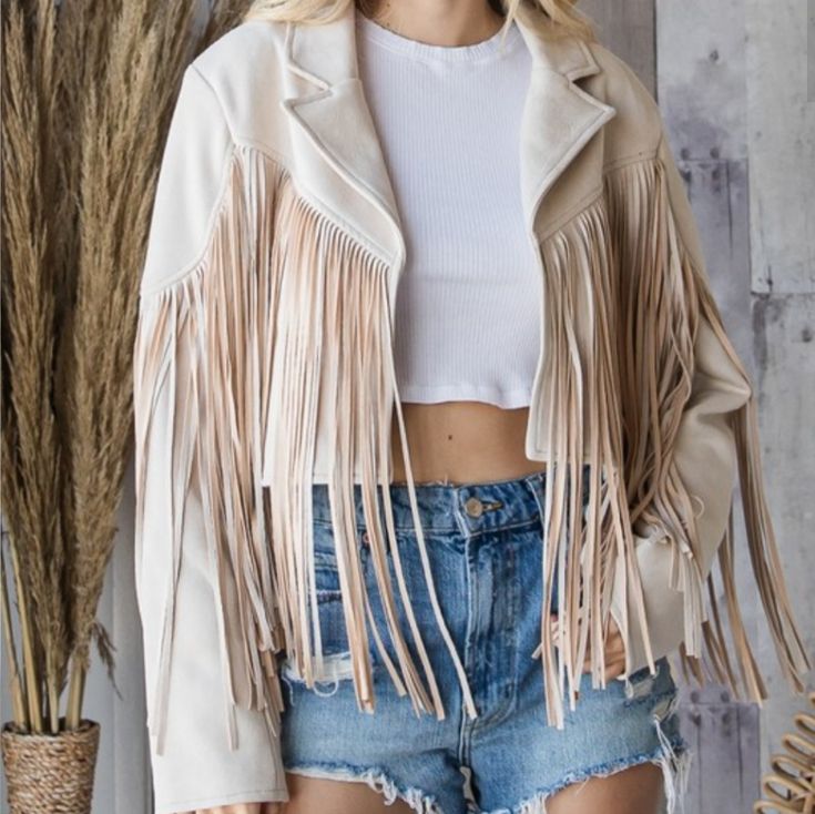 As Country As It Gets With This Amazing Fringe Jacket. You'll Sure Stand Out Everywhere You Go. Suede Moto Fringe Jacket Jacket Is A Cream/Sand Color. Material: 90% Polyester And 10% Spandex Beige Fringed Winter Outerwear, Chic Beige Outerwear With Fringe, Chic Beige Fringe Outerwear, Beige Long Sleeve Outerwear With Fringe, Cream Fringe Outerwear For Winter, Winter Cream Outerwear With Fringe, Spring Cream Outerwear With Fringe, Cream Fringe Outerwear For Spring, Spring Cream Fringe Outerwear