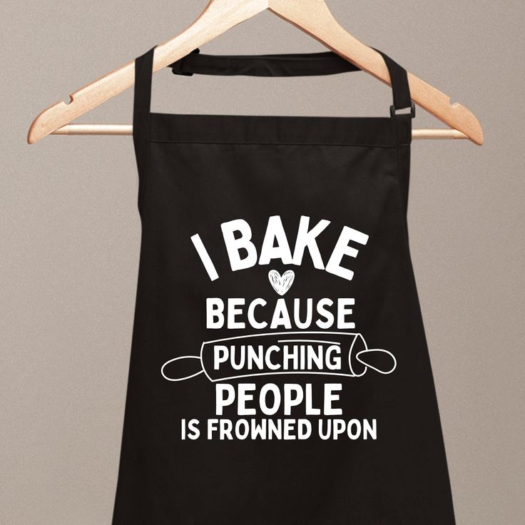 i bake because punching people is pronounced upon apron on hanger with wooden clothes rack