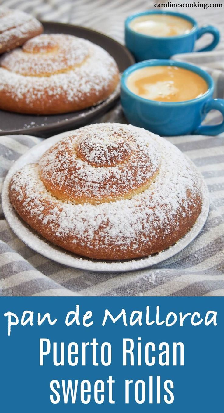 two plates filled with powdered sugar covered pastries on top of a striped table cloth