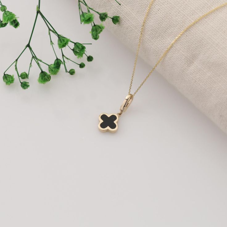 ✨ PENDANT 14K Gold Clover Necklace, Dainty Four Leaf Clover Pendant, Flower Necklace, Gift For Her ✨ Details : *Gold KT: 14K Solid Gold * Chain lengths:14'',15'', 16'', 18", 20", 22",24" * Pendant width : 10mm * Pendant length :20mm ✨ SHIPPING All the orders will be shipped to the shipping address supplied through your Etsy Order. Please check this address is correct before finishing your check out. Artgenie Jewelry is not responsible for packages shipped to wrong addresses. It is the buyer's responsibility to ensure that all shipping information is correct prior to finish the purchase. ✨ ESTIMATED SHIPPING TIMES USA : 2-5 Business days Canada : 3-6 Business days U.K : 2-5 Business days Europe : 1-3 Business days ✨ STORE: https://www.etsy.com/shop/artgeniejewelry If you have any questions, Black Pendant Necklace For Mother's Day, Black Minimalist Jewelry For Birthday Gift, Minimalist Black Jewelry For Birthday Gift, Black Clavicle Chain Necklace For Her, Black Necklaces For Anniversary And Mother's Day, Black Round Jewelry For Birthday Gift, Black Pendant Jewelry For Mother's Day, Elegant Flower-shaped Necklace For Birthday Gift, Black Necklace For Birthday And Mother's Day Gift