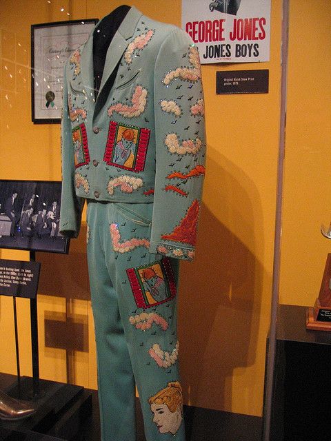 George Jones' Nudie Suit blue Nudie Suit, Porter Wagoner, Gram Parsons, Western Costume, Orville Peck, Rock Star Outfit, Embroidered Suits, Western Glam, Rhinestone Cowboy