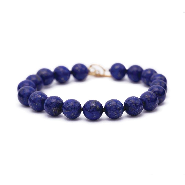 Crystal healing Lapis Lazuli Bracelet known for harmonizing the heart and mind Classic Natural Stones Bracelet As Gift, Classic Natural Stone Bracelets As Gift, Adjustable Gemstone Beads Bracelet For Formal Occasions, Classic Adjustable Gemstone Bracelet, Formal Adjustable Bracelets With 8mm Beads, Adjustable 8mm Bead Bracelets For Formal Occasions, Elegant 8mm Beads Bracelet For Meditation, Timeless Blue Round Bracelets, Classic Everyday Gemstone Bracelets