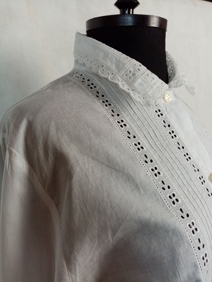 Vintage romantic blouse, button up, lace trim, long sleeve, 100% cotton. In very good clean condition. Flat measurements: shoulders - 37 cm/ 14.5'' chest/pit to pit/ - 49 cm/ 19.2'' sveeve/from shoulder/ - 64 cm/ 25.2'' lenght - 65 cm/ 25.5'' The measurements correspond to the size M Elegant Cotton Eyelet Tops, Elegant Eyelet Tops For Daywear, Classic Cotton Blouse With Lace Trim, Collared Cotton Blouse With Lace Trim, Daywear Eyelet Button-up Top, Cotton Eyelet Long Sleeve Tops, Cotton Blouse With Lace Cuffs, Victorian Cotton Blouse With Lace Collar, Victorian Long Sleeve Cotton Blouse