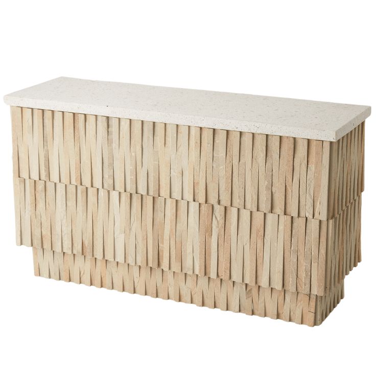 a large wooden box sitting on top of a white surface