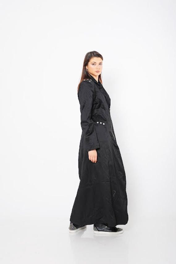 "Black Maxi Coat, Women Warm Coat, Steampunk Trench Coat ♛ All of Rosche's pieces are created with the sole purpose that YOU feel beautiful! Enjoy unique details in combination with high-quality materials every day and make a statement every place you go! ♛ Extravagant and casual at the same time. Comfortable and stylish. The floor length makes it look different and unique. Avant garde piece. Wear it both: with your sneakers or high heels. Long zipper closure. ♛ Perfect for every occasion! ♛ Cus Hooded Black Outerwear For Costume Party, Black Hooded Outerwear For Costume Party, Edgy Black Outerwear For Costume Party, Black Outerwear For Cosplay Events, Fitted Long Coat In Punk Style, Fitted Punk Outerwear For Halloween, Alternative Long Sleeve Outerwear For Costume Party, Black Outerwear For Winter Costume Party, Black Outerwear For Costume Party In Winter