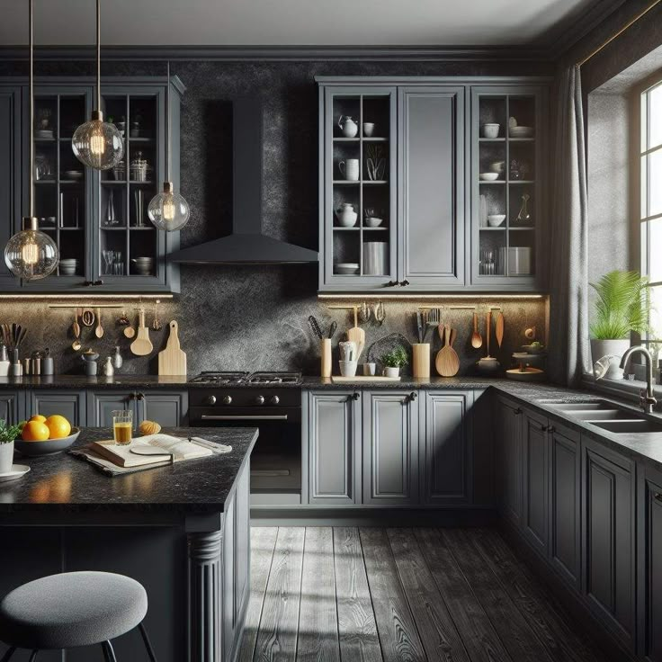 a kitchen with gray cabinets and wooden floors