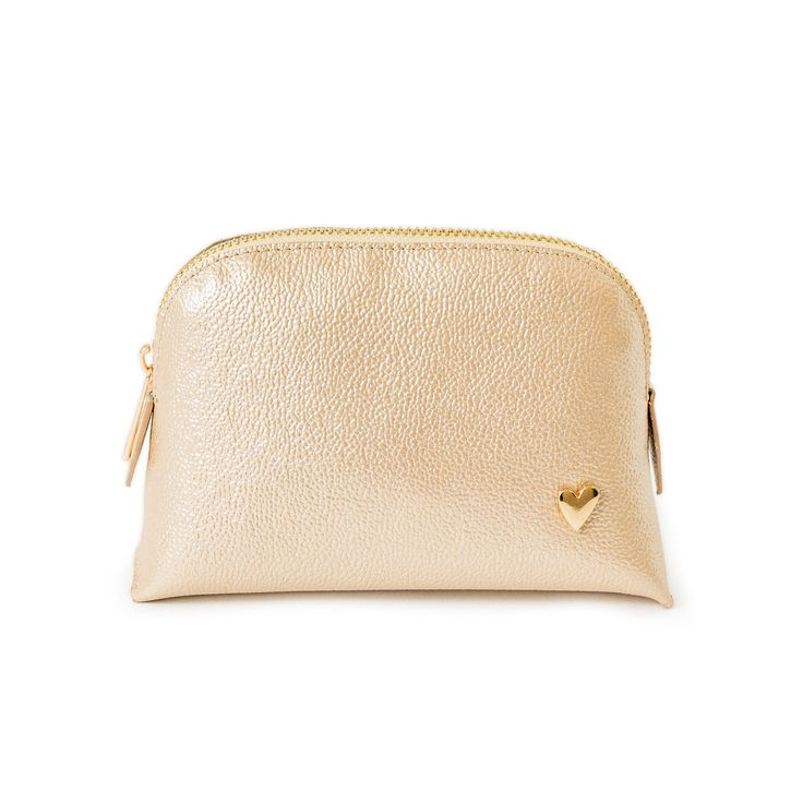 Our cosmetic bag is perfect for carrying your makeup and skincare organized. They are designed to fit perfectly in your purse or your travel bag! Features El portacosméticos no incluye los productos de la imagen. Genuine Leather Signature Heart Interior pocket Designed to stand in their own 4.5" H, 6.5" W, 2" D Gold Rectangular Case Bag For Everyday, Portable Pouch Cosmetic Bag As Gift, Compact Travel Cosmetic Bag With Zipper, Modern Zipper Pouch Cosmetic Bag For Storage, Trendy Portable Pouch For Cosmetic And Toiletry Storage, Compact Cosmetic Bag With Removable Pouch For Travel, Modern Cosmetic Bag With Zipper Pouch, Modern Cosmetic Bag With Zipper, Modern Portable Cosmetic Bag For On-the-go