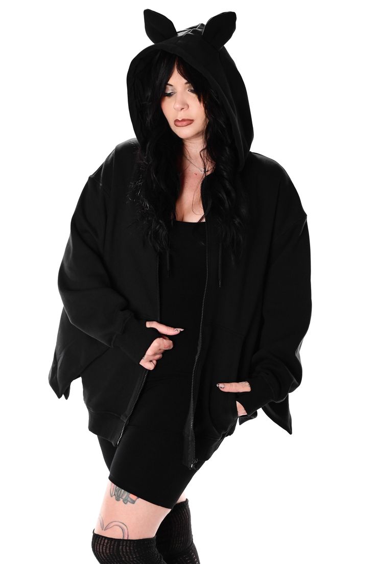 New for Foxblood Halloween 2024!! Oversized and ultra comfy hoodie with the cutest little bat ears, complete with wings attached to the sleeves and thumbholes. Zip up front and drawstring hood. Models wearing size M/L and XL/2XL. Fits oversized. 60% Cotton 40% Polyester Part of the FOXBLOOD Signature Collection, designed by us in Los Angeles, and made by our trusted partner factory in China. Batwing Hoodie, Bat Ears, Halloween News, Halloween 2024, Beauty Sale, Comfy Hoodies, Signature Collection, Bat Wings, Sock Shoes