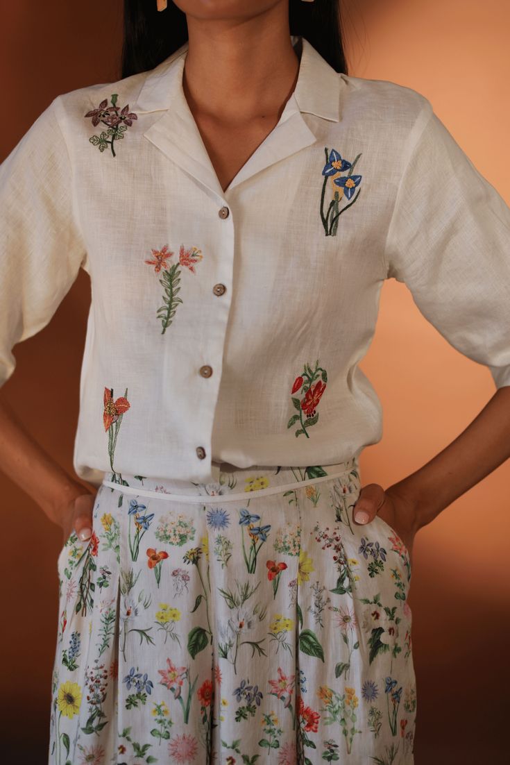 white embroidery floral shirt top sustainable brand cotton hemp Casual Cotton Blouse With Embroidered Cuffs, Embroidered Tops With Relaxed Fit And Camp Collar, Floral Print Spread Collar Blouse For Summer, Summer Floral Print Blouse With Spread Collar, Summer Blouse With Button Cuffs And Lapel Collar, Embroidered Camp Collar Top With Relaxed Fit, Cotton Tops With Embroidered Cuffs For Work, Cotton Top With Embroidered Cuffs For Work, Casual Collared Blouse With Floral Embroidery