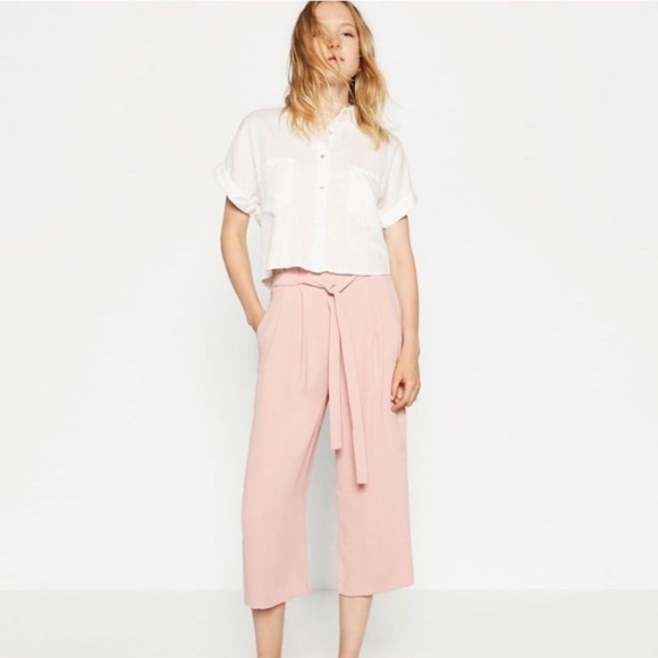 Adorable Soft Pastel Pink Culottes (Cropped Pants) From Zara Basic In Size M. Brand New, Never Worn! Elastic Waistband, Chiffon Material. Paperbag Style On The Waist And Built In Tie Belt. Casual Tie Waist Pants For Day Out, Feminine Wide Leg Bottoms For Daywear, Versatile Summer Daywear Pants, Relaxed Fit Bottoms With Tie Waist For Spring, Spring Versatile Culottes, Spring Pants With Pockets For Day Out, Spring Workwear Bottoms With Tie Waist, Versatile Spring Culottes Ankle-length, Spring Daywear Bottoms With Tie Waist