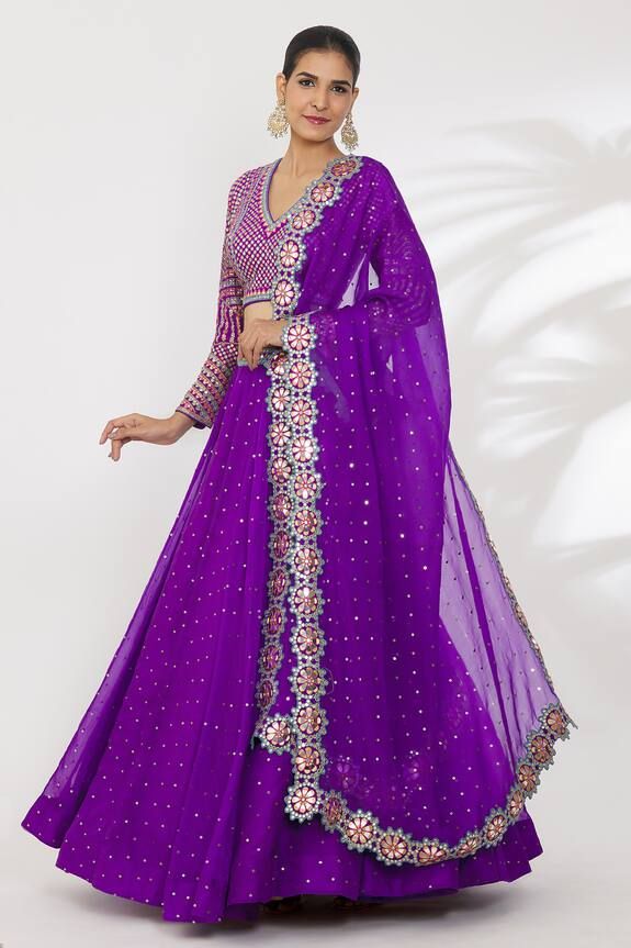 Purple lehenga with sequin, mirror, zari thread embroidery. Paired with embroidered blouse and cutwork border embroidered dupatta. - Aza Fashions Dola Silk Palazzo Set With Zari Work For Reception, Floor-length Dola Silk Palazzo Set For Reception, Floor-length Palazzo Set With Zari Work For Reception, Festive Chanderi Lehenga With Resham Embroidery, Reception Salwar Kameez With Mirror Work For Navratri, Unstitched Palazzo Set With Mirror Work For Reception, Navratri Reception Salwar Kameez With Mirror Work, Navratri Salwar Kameez With Mirror Work For Reception, Festive Dola Silk Palazzo Set With Mirror Work