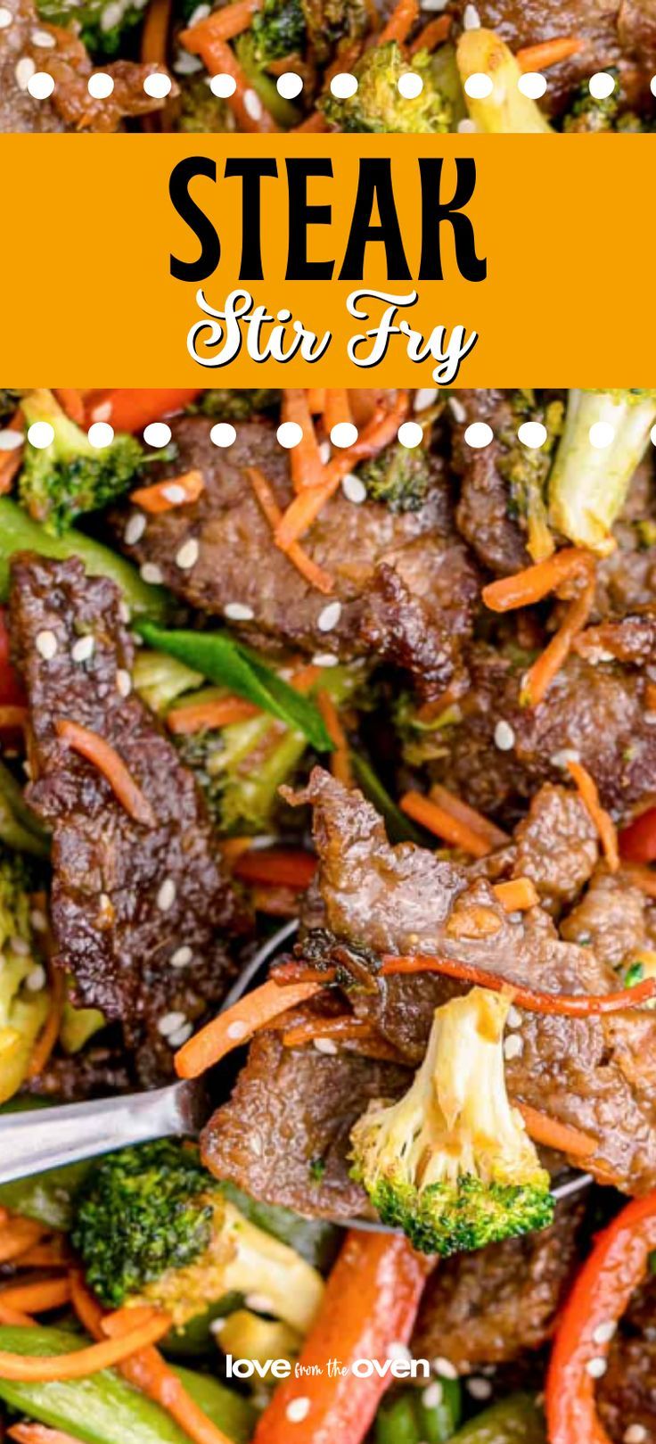 steak stir fry with broccoli, carrots and peppers in a pan topped with sesame seeds