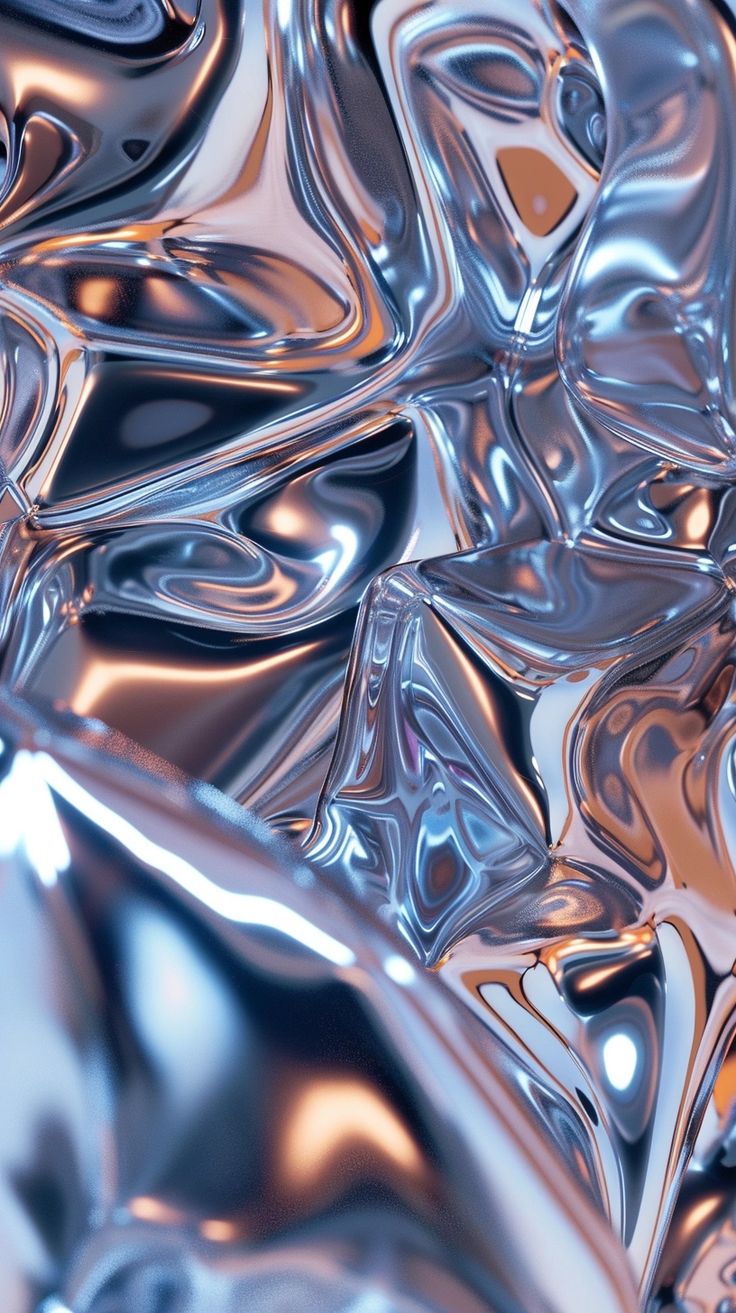 an image of some shiny material that looks like liquid or glass, as well as metallic foil