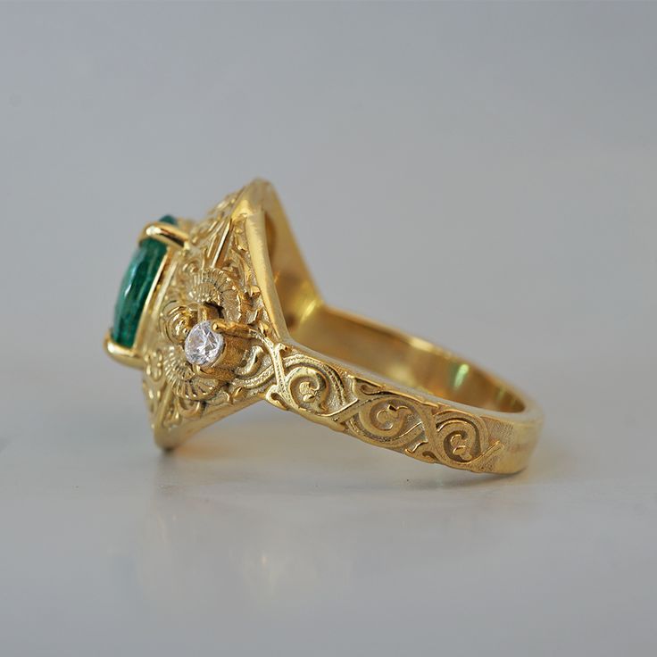 Introducing the "Emerald Scarab Ring" – a captivating blend of ancient Egyptian mystique and timeless elegance. Centered with a lush emerald framed by intricate Islamic patterns inspired by Egypt's architectural wonders, this ring evokes the opulence of ancient Egypt. Flanked by scarabs symbolizing rebirth, each holds a radiant diamond, echoing the sun's eternal sparkle on the Nile's waters. All orders come in our Tippy Taste ring box. This ring is handmade and designed in NYC. 14K or 18K solid gold Natural oval emerald, 8*6mm, approx. 1.20ct Natural round diamonds. SI clarity, GH color, 0.06ct total carat weight 3mm ring band ** Tippy Taste Heirloom Collection is made to order. Please allow 3-4 week turnaround time. Shipping:Domestic: Free shippingInternational: Free shippingAll orders ar Elegant 14k Stamped Emerald Ring, Fine Jewelry Yellow Gold Emerald Ring With Intricate Design, Fine Jewelry Emerald Ring With Intricate Design, Emerald Ring With Rose Cut Diamonds For Formal Occasions, Formal Emerald Ring With Intricate Design, Gold Emerald Ring With Intricate Heirloom Design, Gold Emerald Heirloom Ring With Intricate Design, Emerald Rings With Intricate Design For Anniversary, Ceremonial Yellow Gold Emerald Heirloom Ring