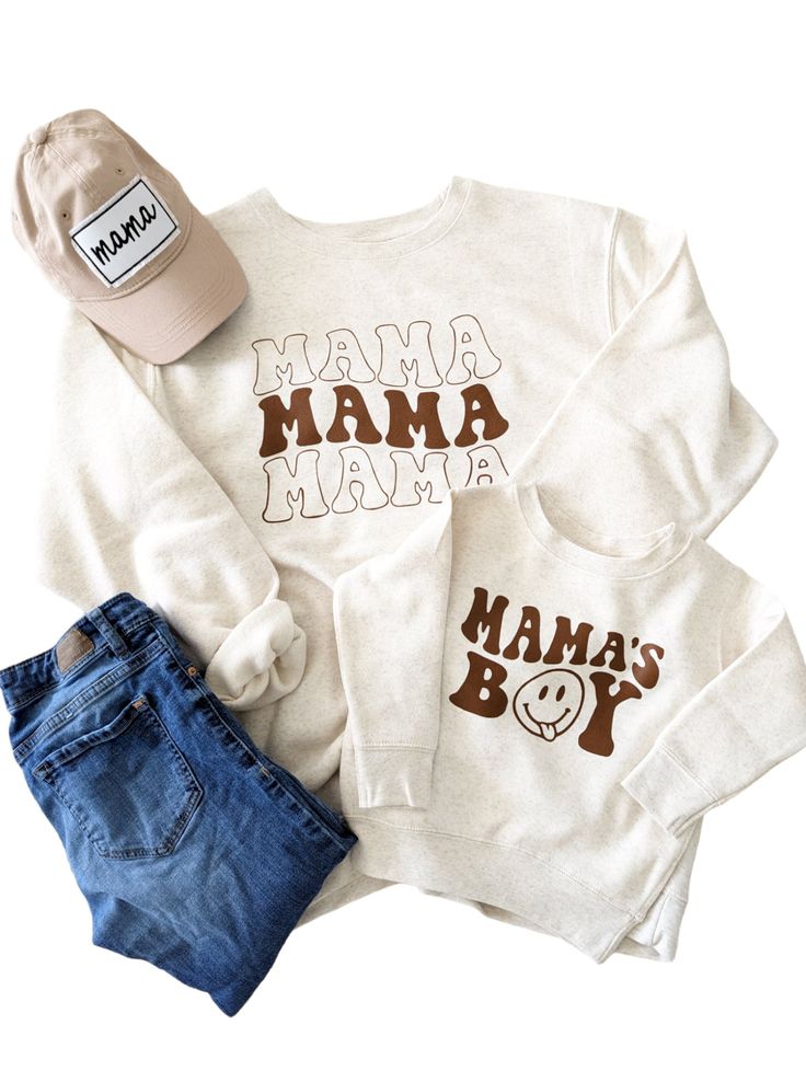 For additional Matching Mama's Girl Sweatshirt Click Here For additional Matching Mama's Boy Sweatshirt Click Here -Spun from plush sponge fleece fabric -Remarkably soft unisex pullover -Crewneck sweatshirt lends itself to daily wear and year-round layering. -Featuring ribbed cuffs and waistband, a crew neck, and fashion-forward fleece fabrication. - Wash on cold dry on delicate - brown ink - Unisex True oversized fit - Color Oatmeal Cream Letter Print Sweatshirt For Loungewear, Cozy Fit Long Sleeve Top With Letter Print, Winter Cream Graphic Print Tops, Winter Graphic Print Cream Tops, Winter Cream Tops With Graphic Print, Cream Letter Print Top For Winter, Cream Winter Top With Letter Print, Cream Tops With Letter Print For Winter, White Top With Graphic Print And Cozy Fit