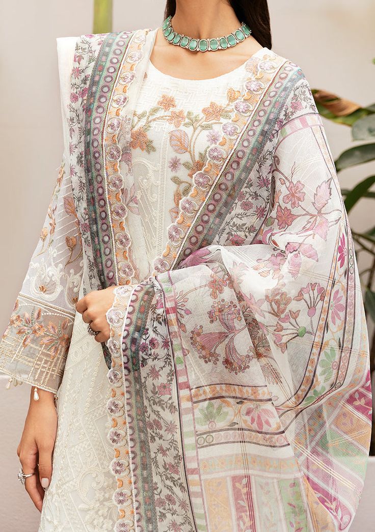 Introducing our Chiffon collection DASTAN by Ramsha designed to make you look and feel your best These pieces will add a touch of class and elegance to your wardrobe. This collection is a beautiful collection of ensembles offering versatile compositions for the latest festive wardrobe requirements. Embroidered Chiffon Front With Sequence. Embroidered Chiffon Back and Sleeves. Embroidered Organza Lace. Embroidered Organza Ghera, and Trouser Lace. Digital printed Dupatta. Raw Silk Trouser. Color: There might be slight color variation due to lighting and flashes while the photo shooting. The color may also vary because of different screen resolutions. Wash Care: Dry Clean Only. Bohemian Georgette Kurta With Sheer Dupatta, Wedding Kurta With Printed Motifs In Georgette, Summer Dresses With Traditional Drape And Printed Motifs, Designer White Dupatta With Printed Motifs, Bohemian Georgette Dresses With Printed Motifs, Bohemian Kurta With Dupatta In Georgette, Bohemian Georgette Kurta With Dupatta, Elegant Floral Print Kurta For Festive Season, Designer White Silk Dresses