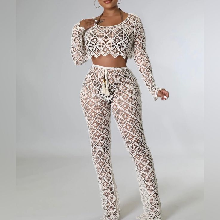 Description: Two Piece Set, Crop Top, Crochet, Round Neckline, Long Sleeves, No Closure, High Waisted Pants, Drawstring, Elastic Waist Band, Color Ivory Inseam Is 35 Inches, Model Is Wearing Small Elegant Two-piece Beach Set, Fitted Cream Lace Sets, Cream Lace Fitted Sets, White Two-piece Beachwear Set, White Two-piece Beach Sets, Beige Long Sleeve Beach Sets, Chic White Beach Sets, Beige Fitted Vacation Sets, White Beachwear Sets For Spring