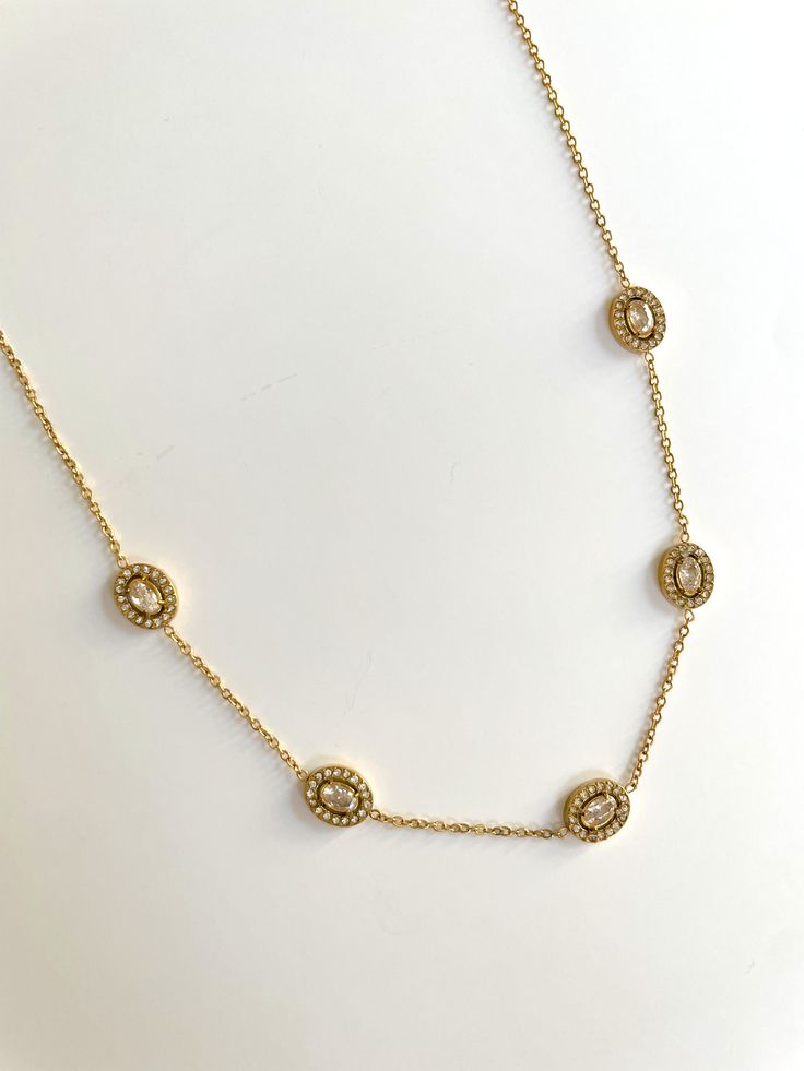 Elevate your style with our luxurious Stainless Steel gold plated zircon necklace. Made from premium materials, this dainty and trending piece will add a touch of sophistication to any outfit. A must-have for those who appreciate the finer things in life. Luxury Gold Oval Diamond Necklace, Classic Gold Oval Diamond Necklace, Gold Oval Cubic Zirconia Necklaces, Elegant Gold Plated Oval Necklace, Gold Diamond Necklace With Oval Pendant, Luxury Gold Diamond Necklace With Oval Pendant, Luxury Gold Oval Pendant Diamond Necklace, Classic Gold Diamond Necklace With Oval Pendant, Gold Oval Diamond Necklace