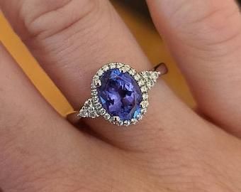 Alexandrite ring leaf ring oval shaped engagement ring June | Etsy Classic Sapphire Rings In Purple, Elegant Oval Tanzanite Birthstone Ring, Formal Oval Tanzanite Birthstone Ring, Oval Tanzanite Halo Jewelry, Elegant Oval Halo Design Birthstone Ring, Heirloom Oval Halo Birthstone Ring, Classic Oval Amethyst Ring With Halo Setting, Oval Tanzanite Birthstone Ring With Accent Stones, Heirloom Oval Birthstone Ring With Halo Setting