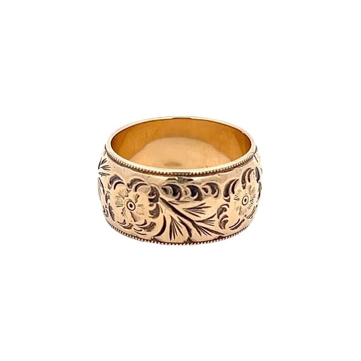 a gold ring with floral designs on it