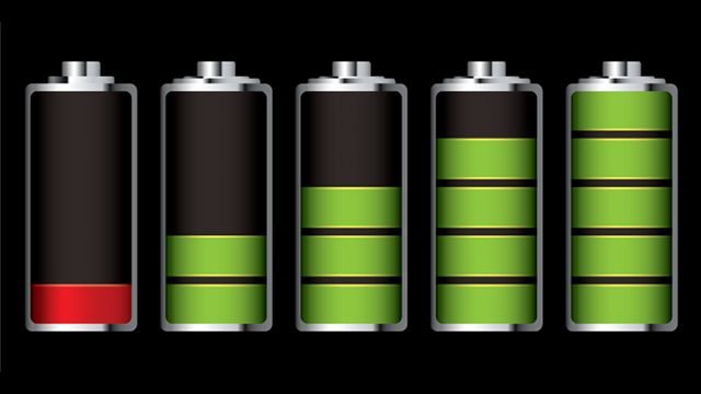 three batteries with green and black stripes on them