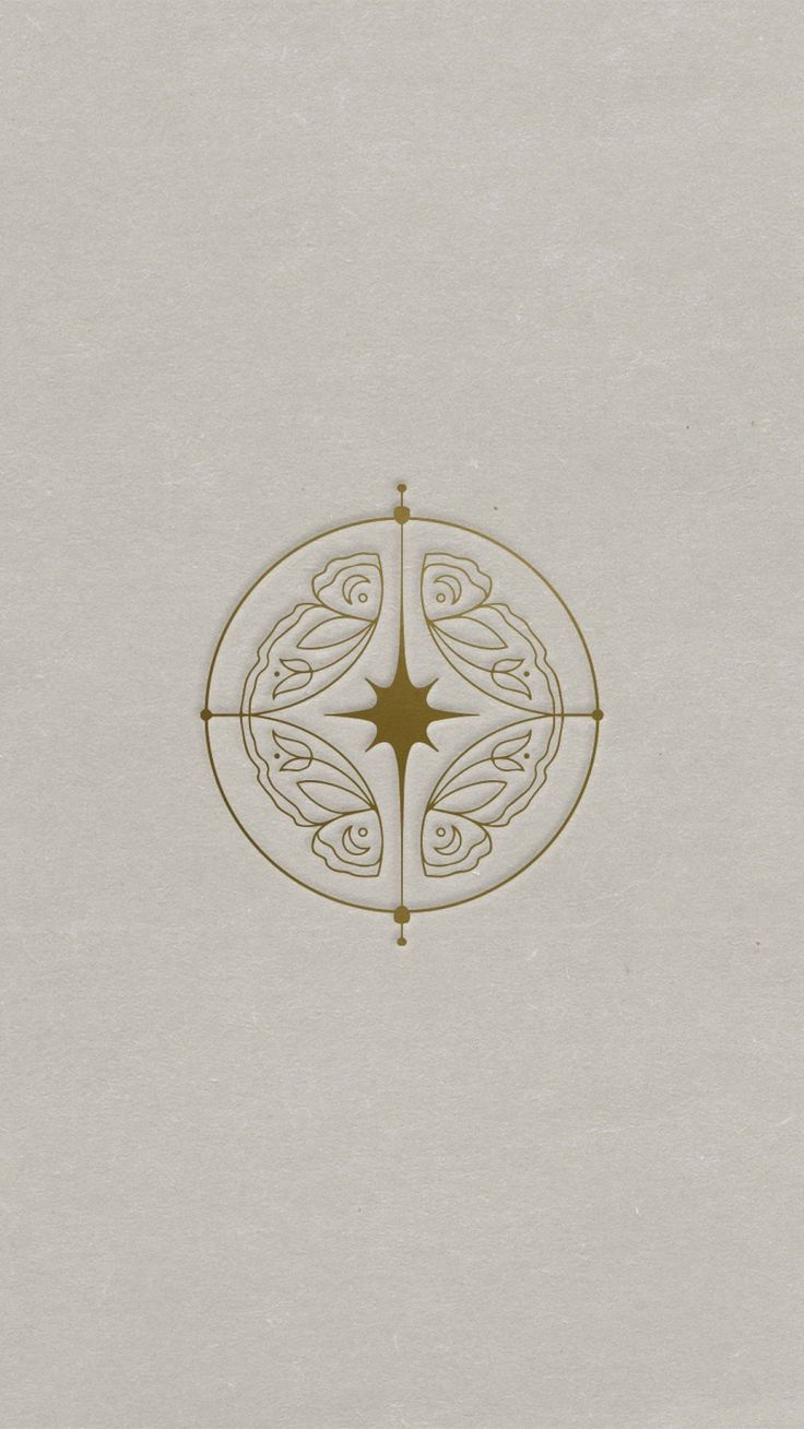 a white wall with a circular design on it's side and a star in the middle