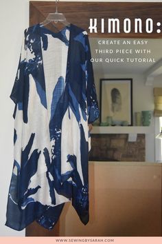 a blue and white dress hanging on a hanger with text overlay that reads, kimono create an easy third piece with our guide