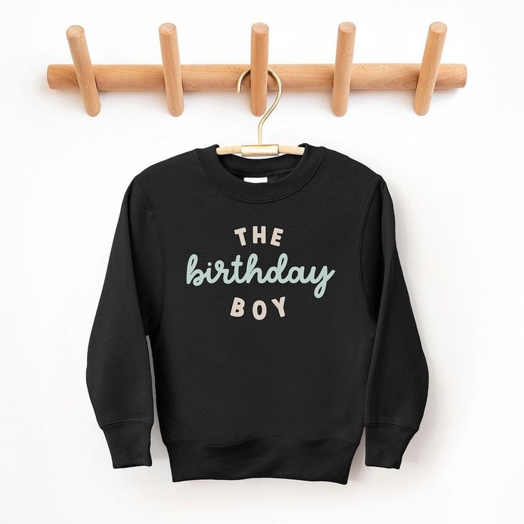 Looking for a cute sweatshirt for your kids? We have the perfect The Birthday Boy graphic sweatshirt addition to their closet! Also available in toddler sweatshirts. Birthday Long Sleeve Hoodie With Letter Print, Birthday Letter Print Long Sleeve Hoodie, Long Sleeve Hoodie With Letter Print For Birthday, Casual Black Sweatshirt For Birthday, Black Casual Sweatshirt, Casual Birthday Sweatshirt With Lettering, Casual Sweatshirt With Lettering For Birthday, Black Long Sleeve Sweatshirt For Birthday, Birthday Long Sleeve Tops With Lettering