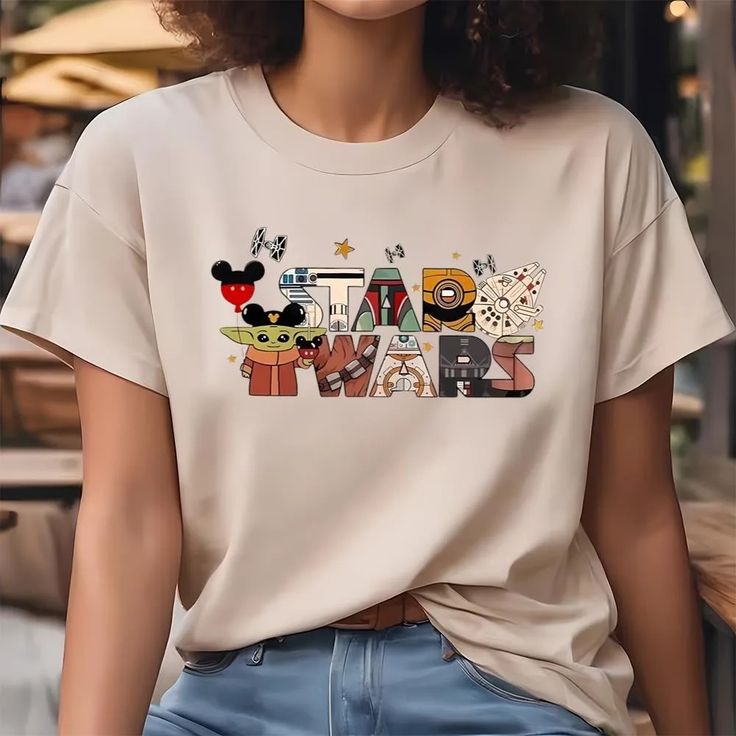 Star Wars Disney T-Shirt Experience the epitome of casual style with our 2D T-Shirts. Crafted for comfort and showcasing unique, eye-catching designs, these tees seamlessly blend fashion with everyday wear. The soft, breathable fabric ensures a cozy feel, making it an ideal choice for any occasion. The 2D graphics add a touch of creativity, transforming a basic tee into a statement piece. Express your individuality with a diverse range of designs, from vibrant patterns to minimalist graphics. Ve Disney T-shirt With Sublimation Print For Fan Events, Disney Fandom Crew Neck T-shirt, Graphic Tee T-shirt For Disney Fan Events, Trendy T-shirt With Character Print For Disney Fan Events, Graphic Tee With Character Print For Disney Fan Events, Relaxed Fit Character Print T-shirt For Disney Fan Events, Disney Letter Print Relaxed Fit T-shirt, Relaxed Fit Graphic T-shirt For Disney Fan Events, Relaxed Fit Graphic Print T-shirt For Disney Fan Events