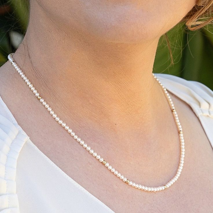 Introducing our exceptional Chinese Freshwater bead nucleated pearl necklace, a genuinely unique piece that stands out as a paragon of pearl excellence. Handpicked from an extensive assortment of over 200 strands of highest quality, this necklace exemplifies the pinnacle of quality in every pearl-related aspect. First and foremost, the pearls possess a mirror-like luster that captures and reflects light in a mesmerizing fashion. Furthermore, the surfaces of these pearls are remarkably clean, sho Elegant Akoya Pearl Beaded Necklace, Elegant Beaded Yellow Gold Pearl Necklace, Elegant Yellow Gold Beaded Pearl Necklace, Elegant Yellow Gold Pearl Necklace With Polished Beads, Akoya Pearl Charm Necklace With Round Beads, Beaded Rondelle Pearl Necklace, Classic Beaded Necklace With Pearl Pendant, Yellow Gold Pearl Beaded Necklaces With Round Beads, Yellow Gold Pearl Beaded Necklace With Round Beads