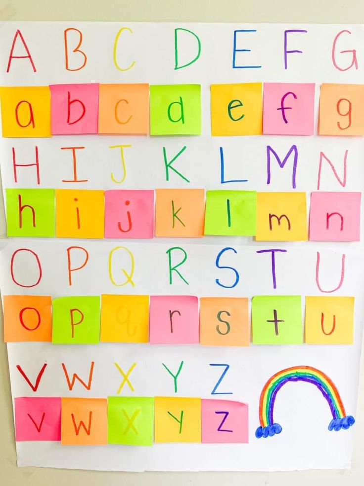 colorful paper letters and numbers on a white board