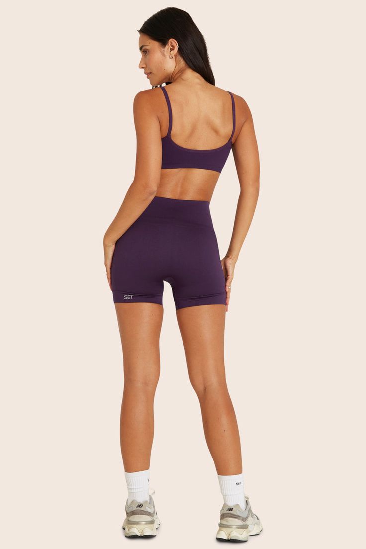 The Sculptflex® Bike Shorts in Fig feature a high-waisted design and ribbed detailing. Seamless for a smooth fit, made from our Sculptflex® fabric for a supportive and flexible workout experience. Seamless Fitted Athleisure Biker Shorts, Seamless High Stretch Biker Shorts, Seamless Fitted Biker Shorts For Sportswear, Seamless High Stretch Biker Shorts, Mid-thigh Length, Sporty Biker Shorts With Seamless Construction, Seamless Fitted High-waisted Activewear Shorts, Fitted Seamless High-waisted Shorts Activewear, Fitted Seamless High-waisted Activewear Shorts, Seamless Biker Shorts For Yoga