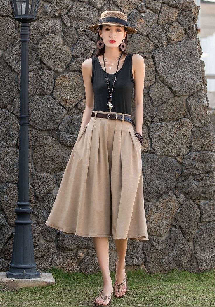 "DETAIL * 50% linen, 50% cotton * Seam pockets * Belt loops * Right zipper closure * A Line skirt * Wash by hand or machine with cold water * Belt is not sale items * The model is 170cm (5′7″) tall with a 80cm (31.5\") bust, 66cm (26\") waist. She is wearing the Khaki skirt in size XS. * Choose CUSTOM Order if you Can't find your size in our size Chart Chang the Length Your Height is not Between 5'1\" - 5\"9\" Your weight is not Between 45kg - 75kg SIZE GUIDE Size vary between Brand and Country Flowy Beige Pleated Midi Skirt, Beige Flowy Midi-length Pleated Skirt, Casual Beige Midi-length Skirt, Casual Beige Midi Length Skirt, Casual Pleated Skirt For Summer Workwear, Casual Summer Pleated Skirt For Workwear, Beige Pleated Midi Skirt, Beige Cotton Midi Length Skirt, Casual Full Skirt In Beige