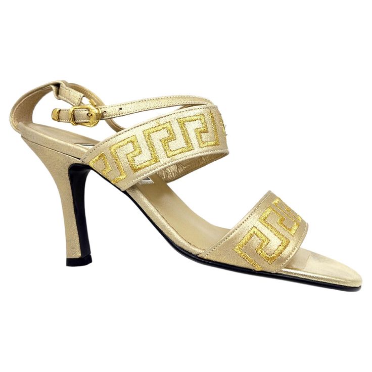 Vintage Gianni Versace gold greca heels in size 36. Feature Material: Gold-tone Leather Condition: Very good, light signs of wear as pictured. Colour: Gold Size: IT 36 Period: 1990- Place of Origin: Italy 1990s Shoes, Versace Gold, Shoes Vintage, Sandal Heels, Gianni Versace, Vintage Shoes, Women's Shoes, Versace, Clothing And Shoes