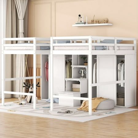 a white bunk bed sitting on top of a hard wood floor